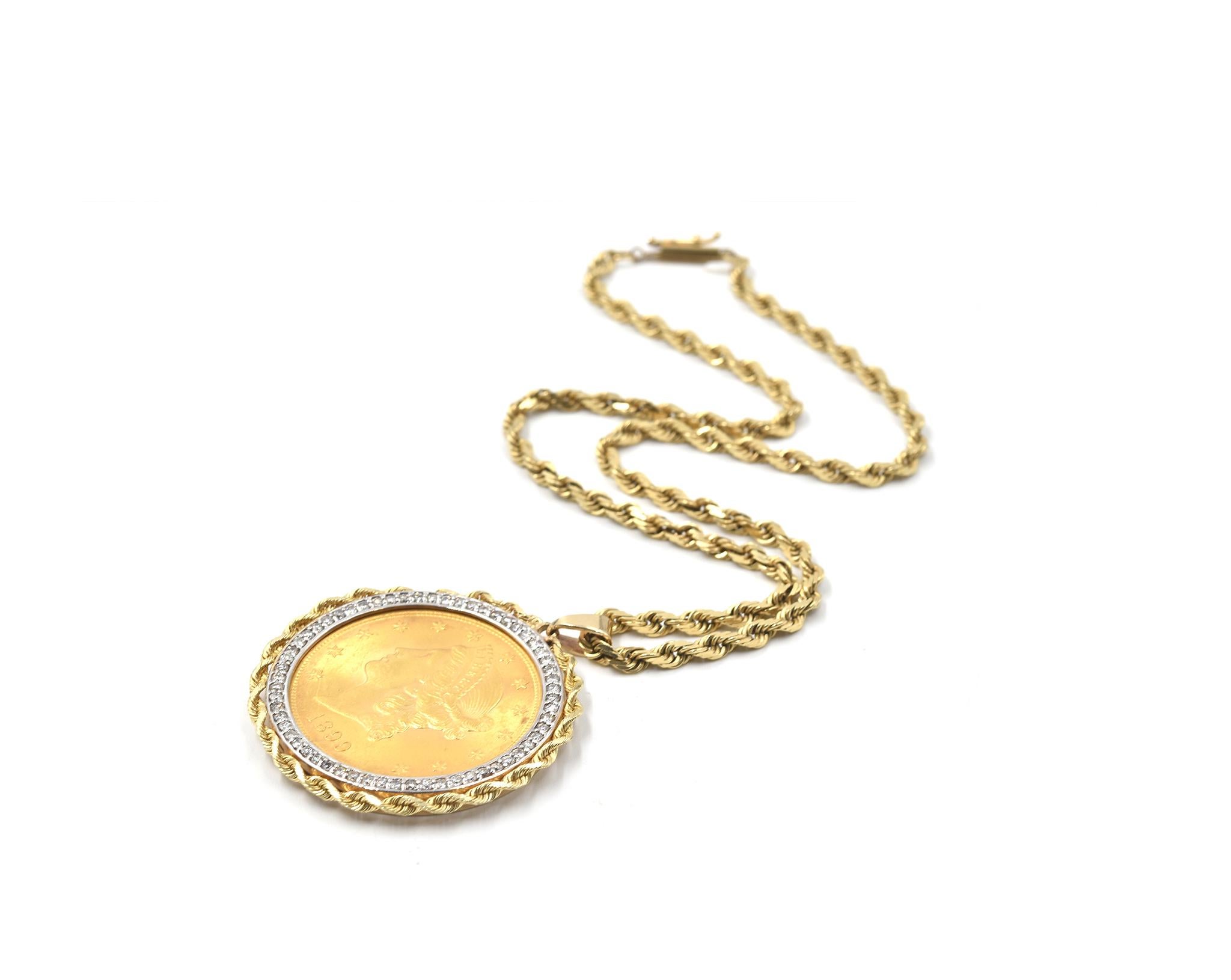 Designer: custom design
Material: 22k yellow gold liberty eagle coin & 14k yellow gold rope necklace
Diamonds: 60 round brilliant cut = 1.00 carat weight
Color: G
Clarity: VS
Dimensions: necklace is 16-inch long, pendant is 1 5/8-inch