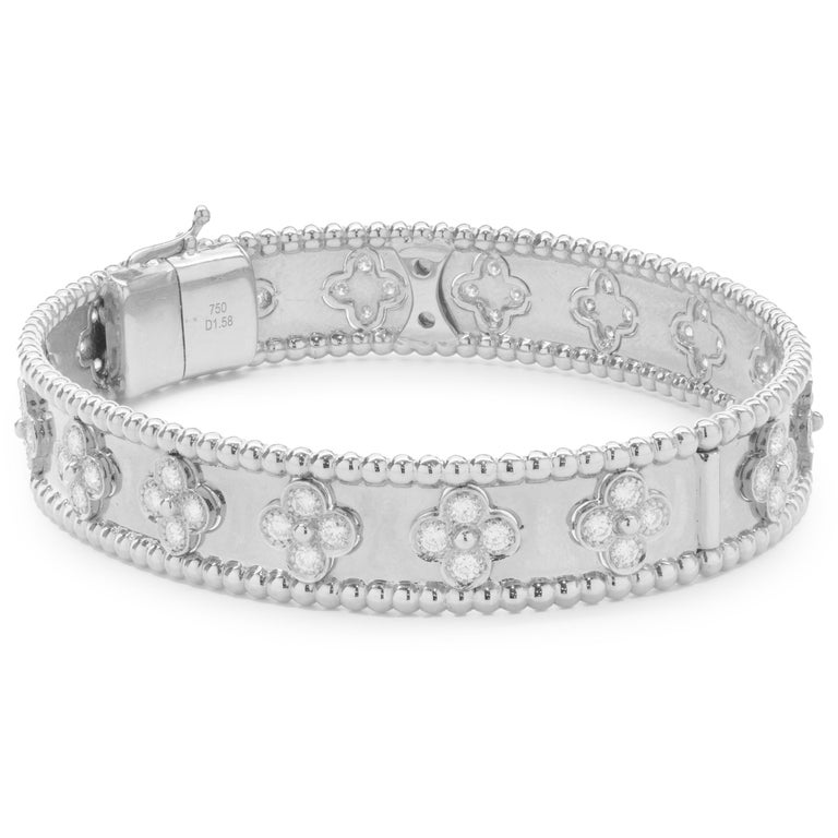 18 Karat White Gold Diamond Flower Bangle Bracelet at 1stDibs