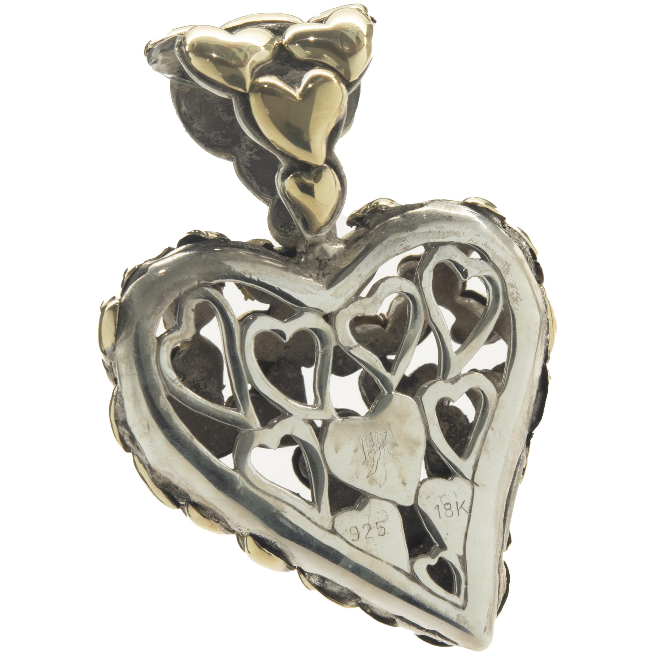 Designer: John Hardy
Material: Sterling Silver / 18K yellow gold
Dimensions: pendant measures 1.5-inches long
Weight: 12.25 grams