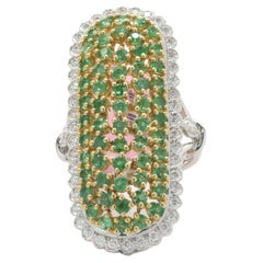 18 Karat White & Yellow Gold Elongated Oval Emerald and Diamond Ring