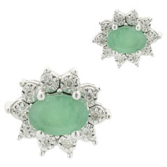 14 Karat White Gold Emerald and Diamond Halo Stud Earrings