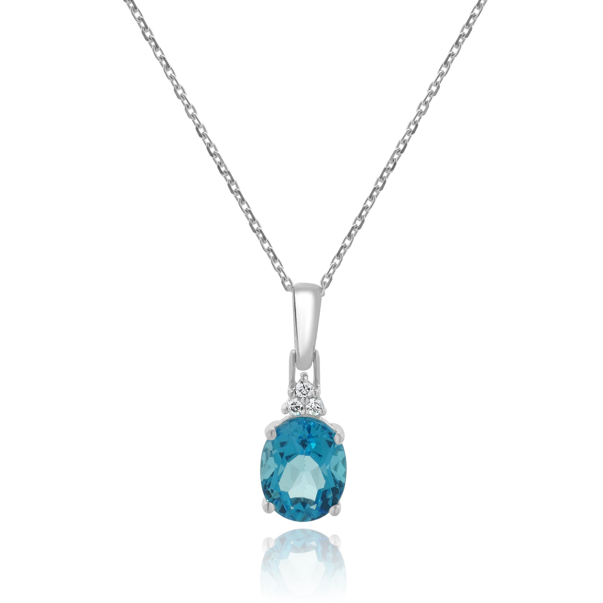 Designer: personalizzato
Materiale: oro bianco 14 carati
Topazio blu: taglio ovale = 3,20cttw
Diamante: 3 tagli rotondi = 0,09cttw
Colore: K
Chiarezza: I2
Peso: 2.80 grammi