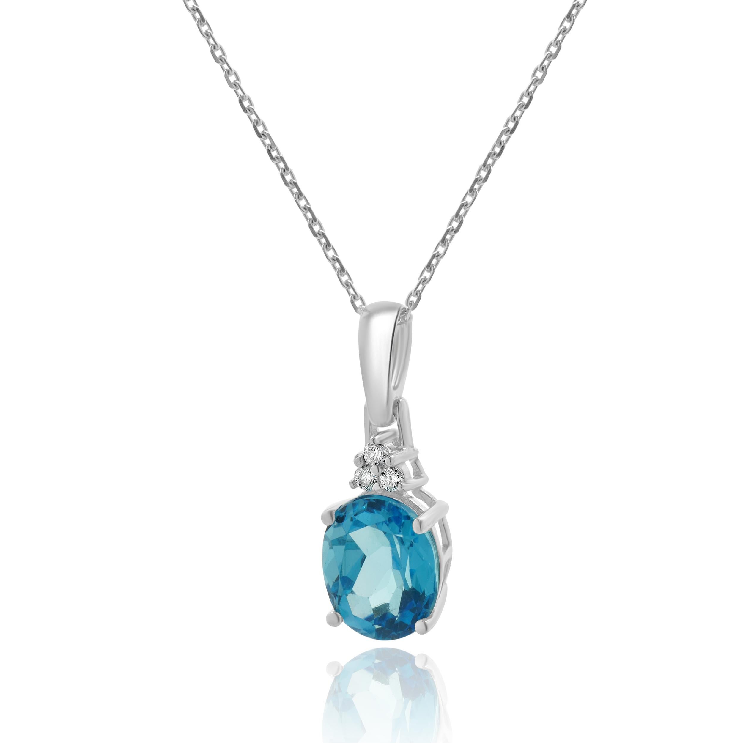 Taglio ovale Collana in oro bianco 14 carati con topazio blu e diamanti in vendita