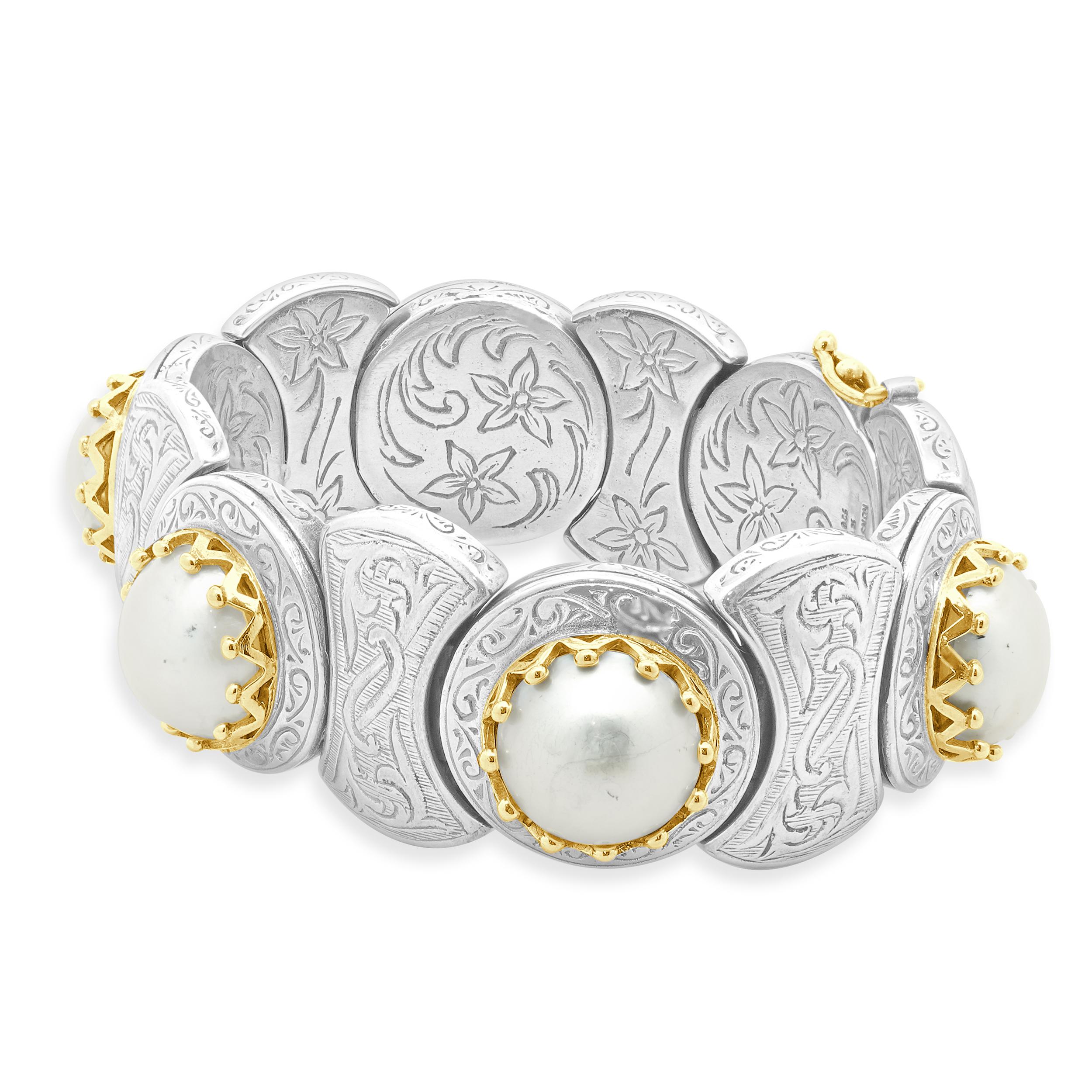 Designer: Konstantino
Material: sterling silver & 18K yellow gold
Dimensions: bracelet will fit up to a 6.5-inch wrist
Weight: 142.40 grams
