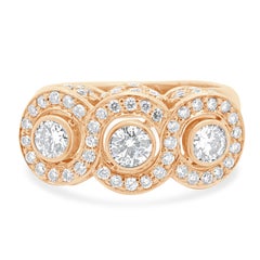 Anillo en línea de tres diamantes en oro rosa de 14 quilates