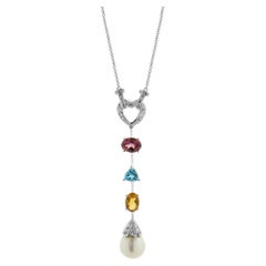 Gota de corazón de oro blanco de 14 quilates con diamantes, granate, topacio azul, citrino y perla N