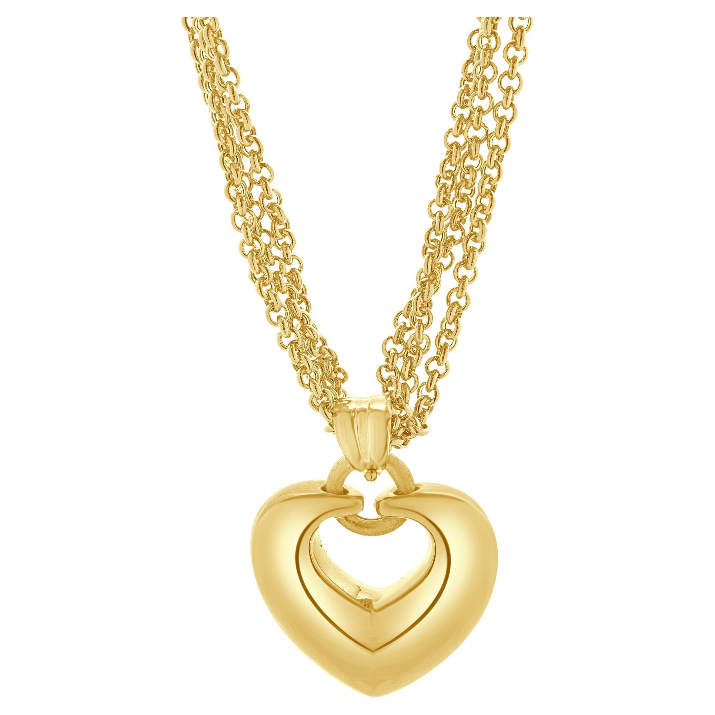 Collier en or jaune 18 carats à trois brins et à cœur ouvert en vente