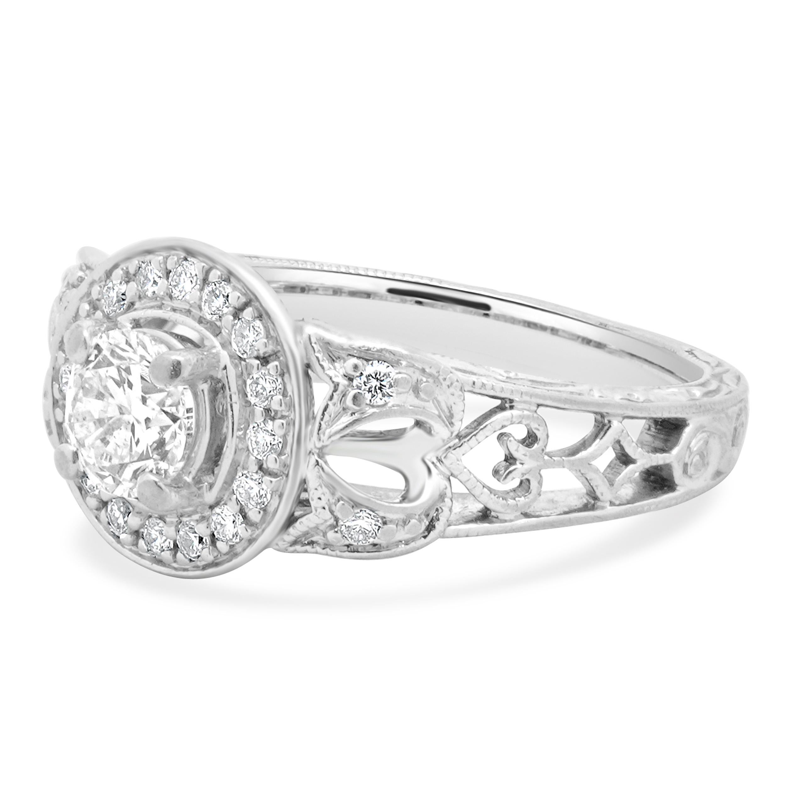Designer: custom
Material: 14K white gold
Diamond: round brilliant cut = 0.40ct
Color: H
Clarity: SI1
Diamond: round brilliant cut = 0.12cttw
Color: H
Clarity: SI1
Ring size: 5.5 (please allow two additional shipping days for sizing