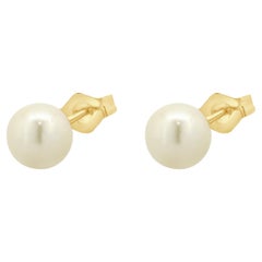 Boucles d'oreilles en or jaune 14 carats avec perles dorées