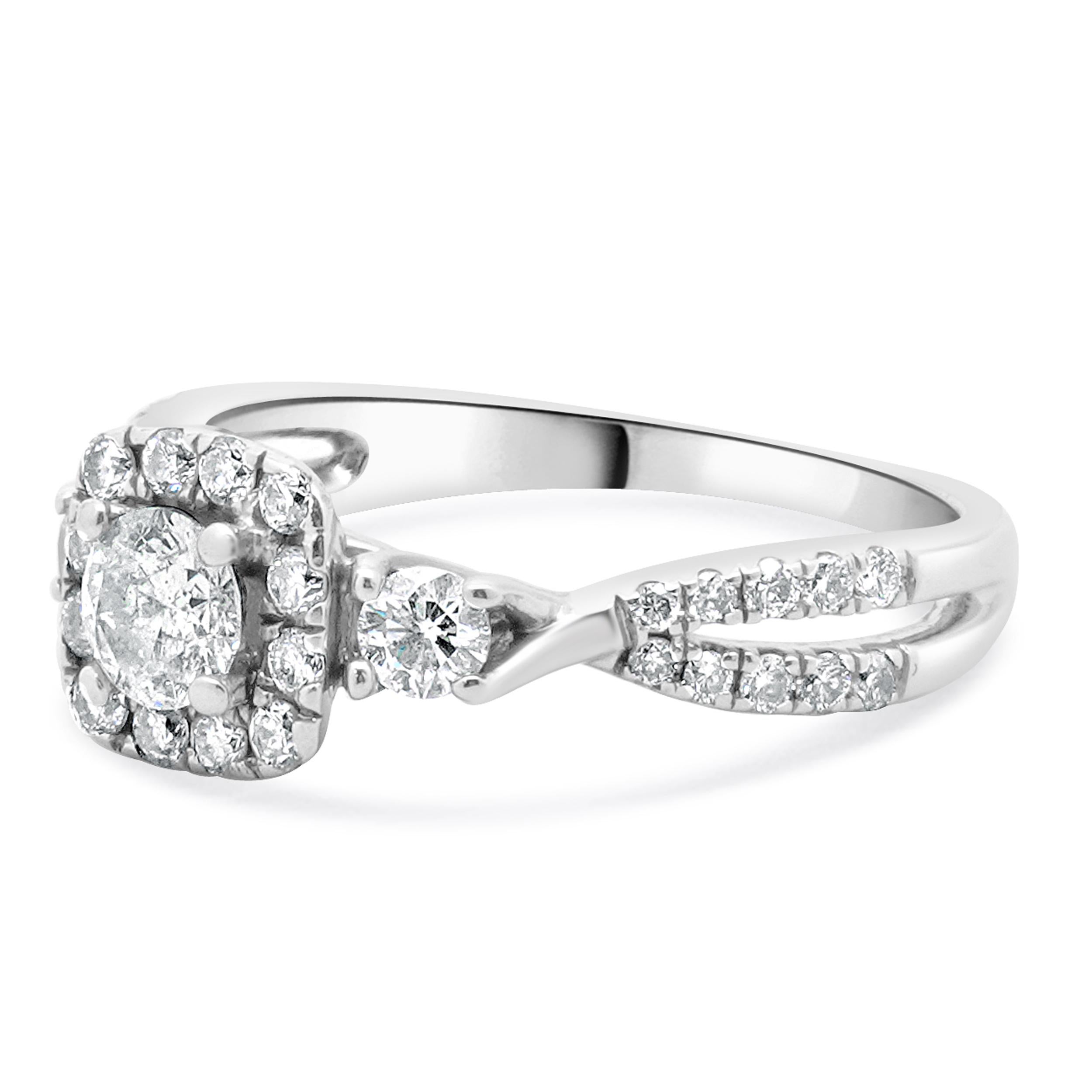 Material: oro blanco de 14 quilates
Diamante central: 1 talla brillante redonda = 0,33 ctw
Color: I
Claridad: SI1
Diamante: 34 talla redonda = 0,36ctw
Color: J
Claridad: I1
Tamaño del anillo: 6,75 (espera hasta 2 días laborables más para solicitar