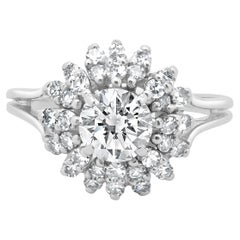 Anello con fiore di diamante in oro bianco 14 carati
