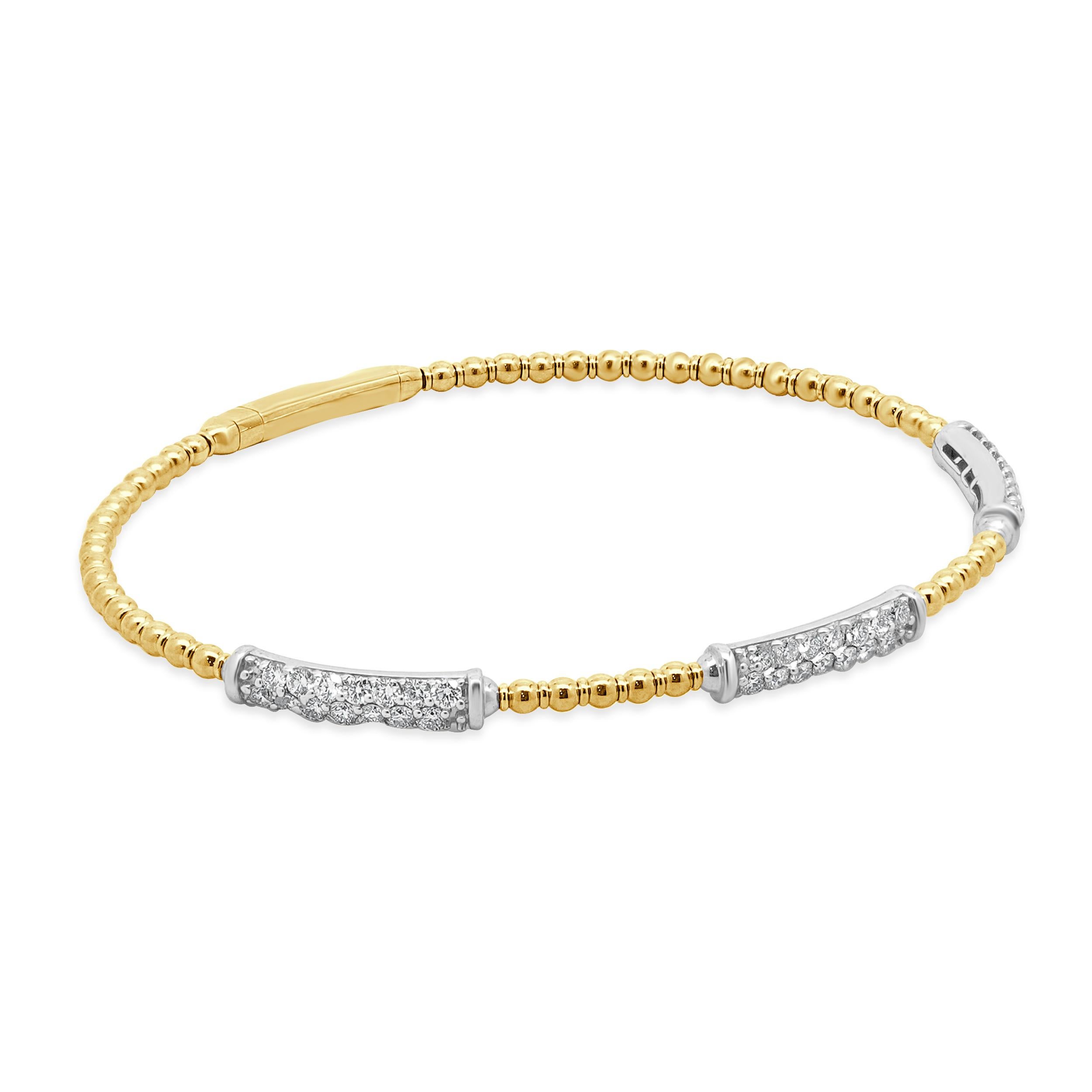 Designer: design personalizzato
Materiale: Oro giallo e bianco 14K
Diamante: taglio brillante rotondo = 0,96cttw
Chiarezza: G
Chiarezza: SI1
Dimensioni: il braccialetto si adatta a un polso di 7 pollici
Peso: 6.32 grammi
