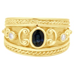 Bague de style étrusque en or jaune 14 carats, sertie d'un saphir bleu taille ovale et de diamants ronds