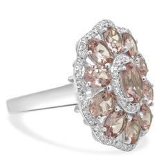 14K White Gold Oval Cut Pink Spinel and Round Diamond Halo Flower Ring