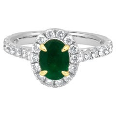 14K White Gold Oval Cut Emerald and Round Diamond Halo Ring