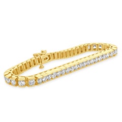 14K Yellow Gold and Channel Set Round Diamond Inline Bracelet 7.25"