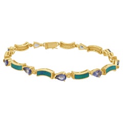 14K Yellow Gold Pear Cut Tanzanite, Opal Inlay, and Round Diamond Bracelet 7.5"