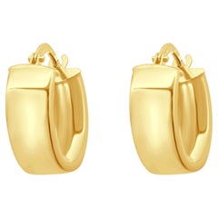 Pendientes de aro ancho de oro amarillo de 14 quilates