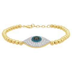 Armband aus 14-Karat-Gelbgold mit Pavé-Fassung aus schwarzen und weißen Diamanten im „Evil Eye“-Design, 7,5"