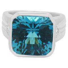 18K White Gold Faceted Blue Topaz and Round Diamond Accent Ring