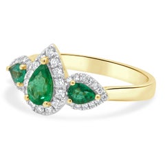 14 Karat Yellow Gold 3-Stone Pear-Shaped Emerald and Round Diamond Halo Ring