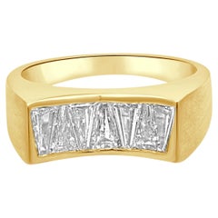 18 Karat Yellow Gold and Channel Set Tapered Baguette Cut Diamond Concave Ring