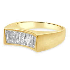 18 Karat Yellow Gold and Channel Set Tapered Baguette Cut Diamond Concave Ring