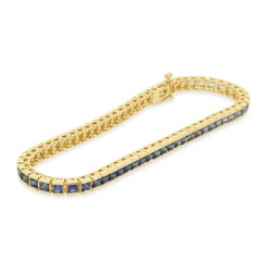 10K Yellow Gold and Princess Cut Graduated Blue Sapphire Inline Bracelet 7.25"