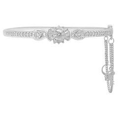 18 Karat White Gold Round, Baguette Cut Diamond Bow Bangle Bracelet, w/Charms