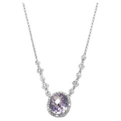 14 Karat White Gold Oval Cut Amethyst and Round Diamond Halo Necklace