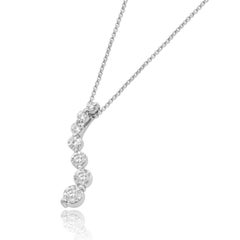 14 Karat White Gold and 7-Stone Shared Prong Set Round Diamond Journey Pendant
