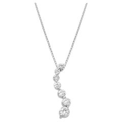 14 Karat White Gold and 7-Stone Shared Prong Set Round Diamond Journey Pendant