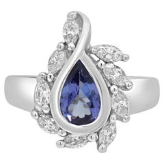 14K White Gold Pear Cut Tanzanite and Marquise Cut Diamond Halo Ring