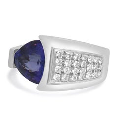 18K White Gold Trillion Cut Tanzanite and Round Diamond Ring