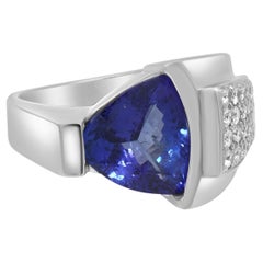 18K White Gold Trillion Cut Tanzanite and Round Diamond Ring