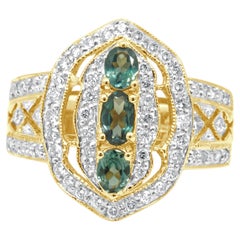 14K Yellow Gold Oval Cut Alexandrite and Round Diamond Ornate Halo Ring