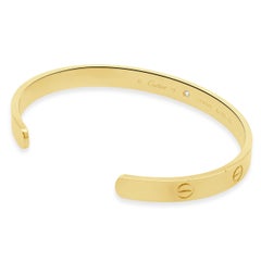 Bracciale a cuffia "Love" con diamanti Cartier in oro 18 carati