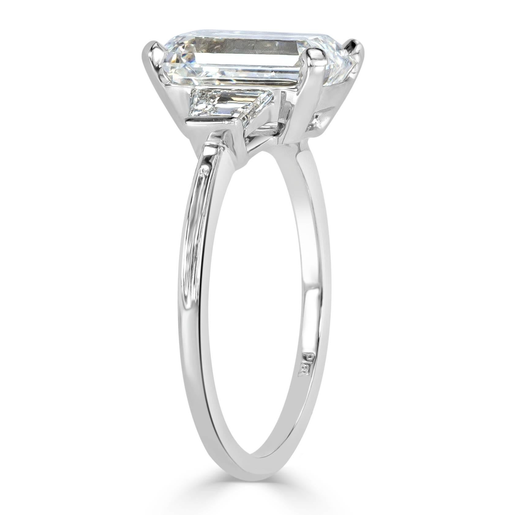 emerald cut diamond three stone ring