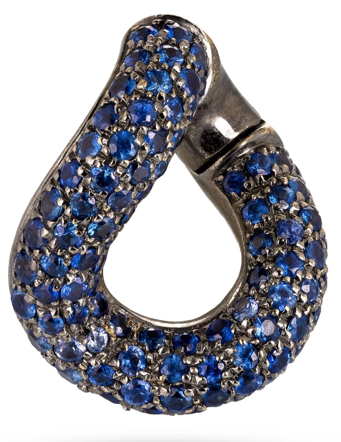 Pomellato Earrings Made of Rhodium Treated 18K White Gold Paved with Stunning Blue Sapphire Stones Approximately 3 Carats.
Marked: Pomellato, 750