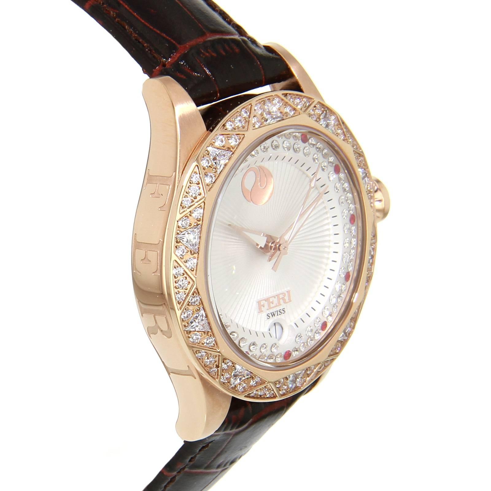 White dial
Swiss made movement
Rose gold toned case
3 piece Solid Stainless Steel Case 
Genuine leather band with metal clasp
10 ATM of water resistance
Date Function
Sapphire crystal glass face 
Set with over 80 beautiful clear and red stones
3