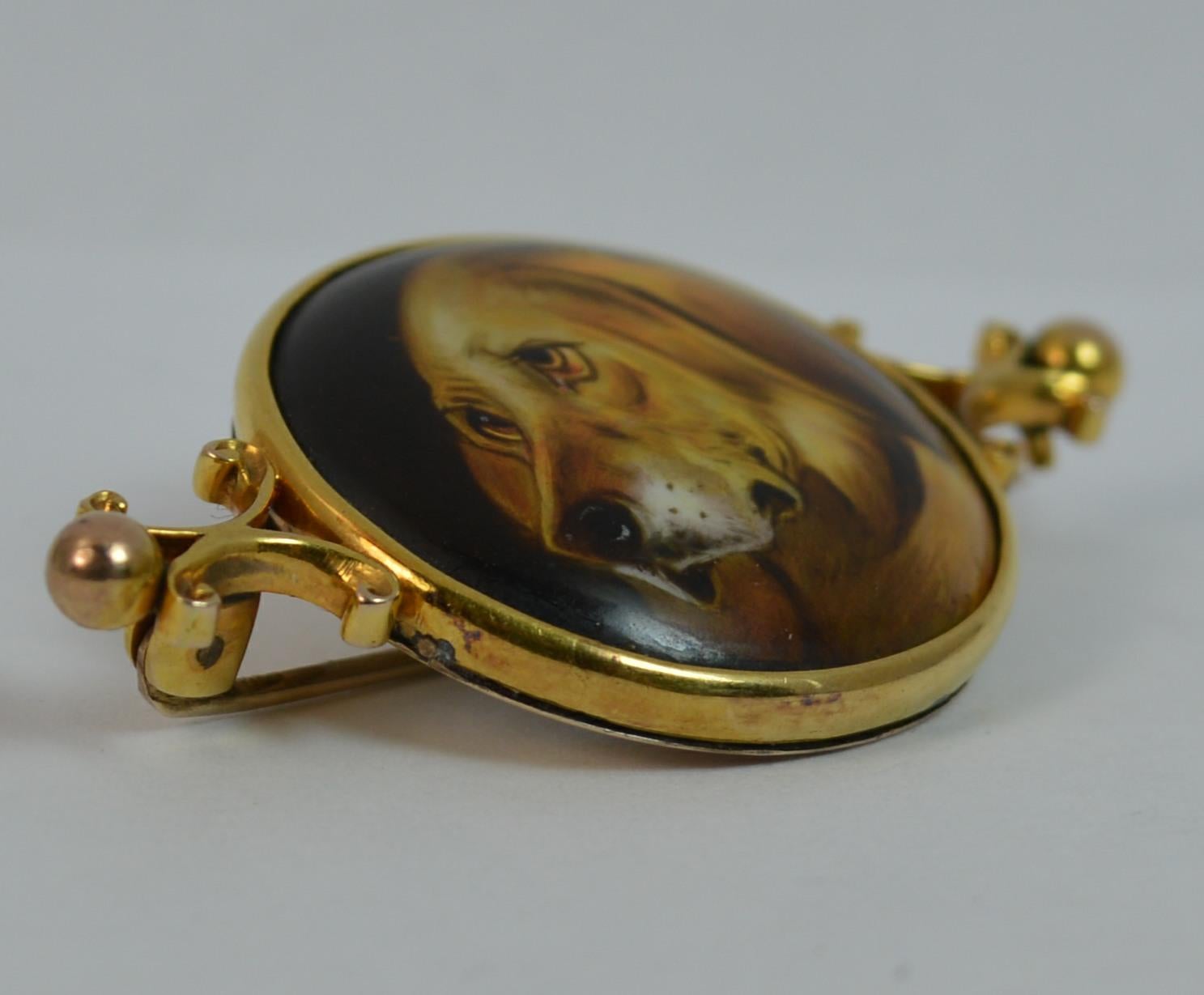 
A fantastic quality mid Victorian period brooch.

Modelled in 15 carat gold and set with a large circular panel to the centre of a Spaniel Dog.

The spaniel has been expertly hand painted throughout.

Complete with a glass locket compartment to the