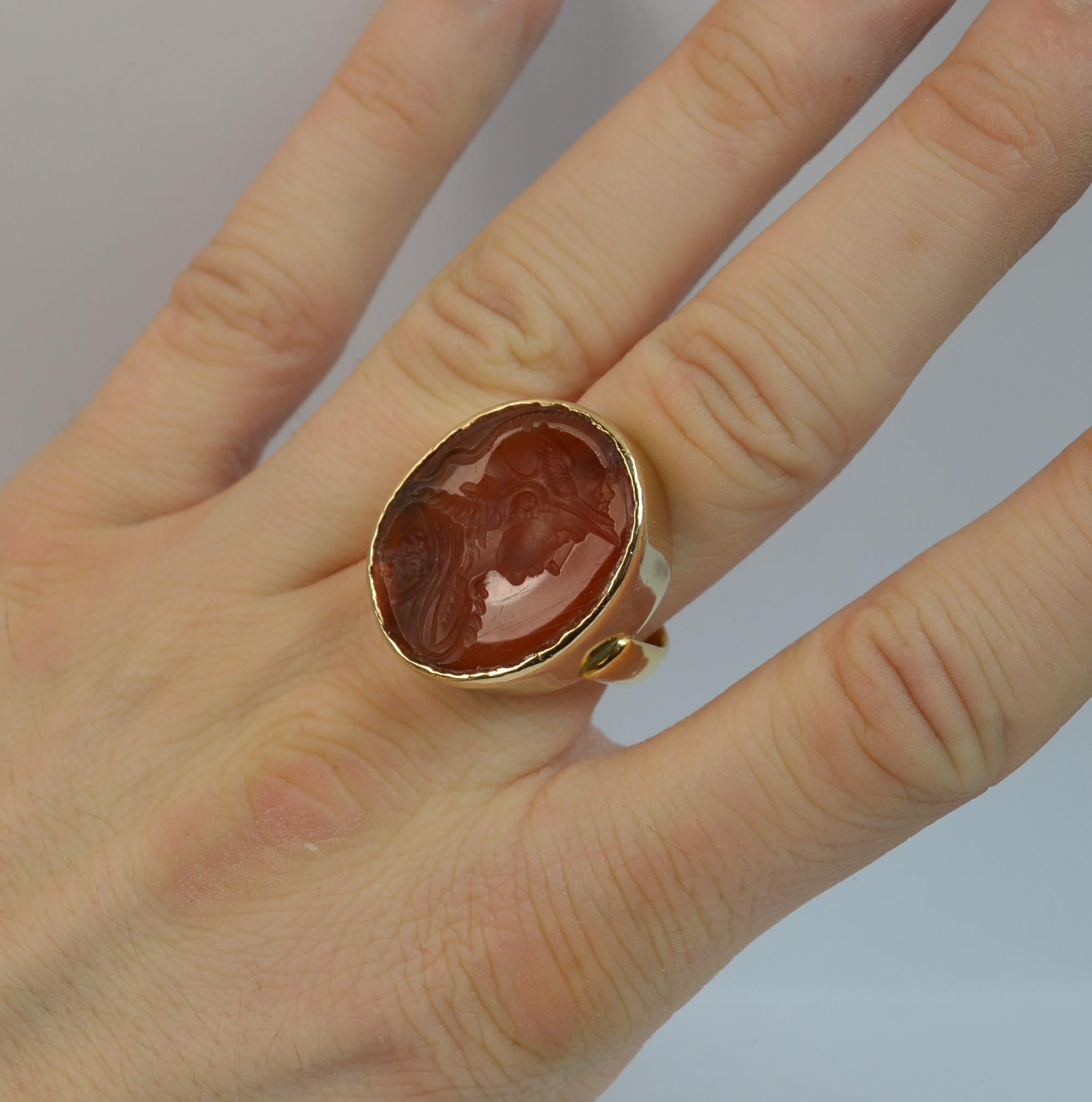 
A stunning 22 carat gold and carnelian ring.

20mm x 25mm oval shaped carnelian with a top quality intaglio carving of the Roman God Mercury.

He is the god of financial gain, commerce, eloquence, messages, communication, travelers, boundaries,