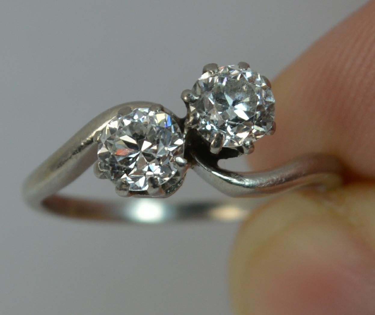 Edwardian VS 0.70 Carat Old Cut Diamond 18 Carat Gold Toi Et Moi Twist Two-Stone Ring