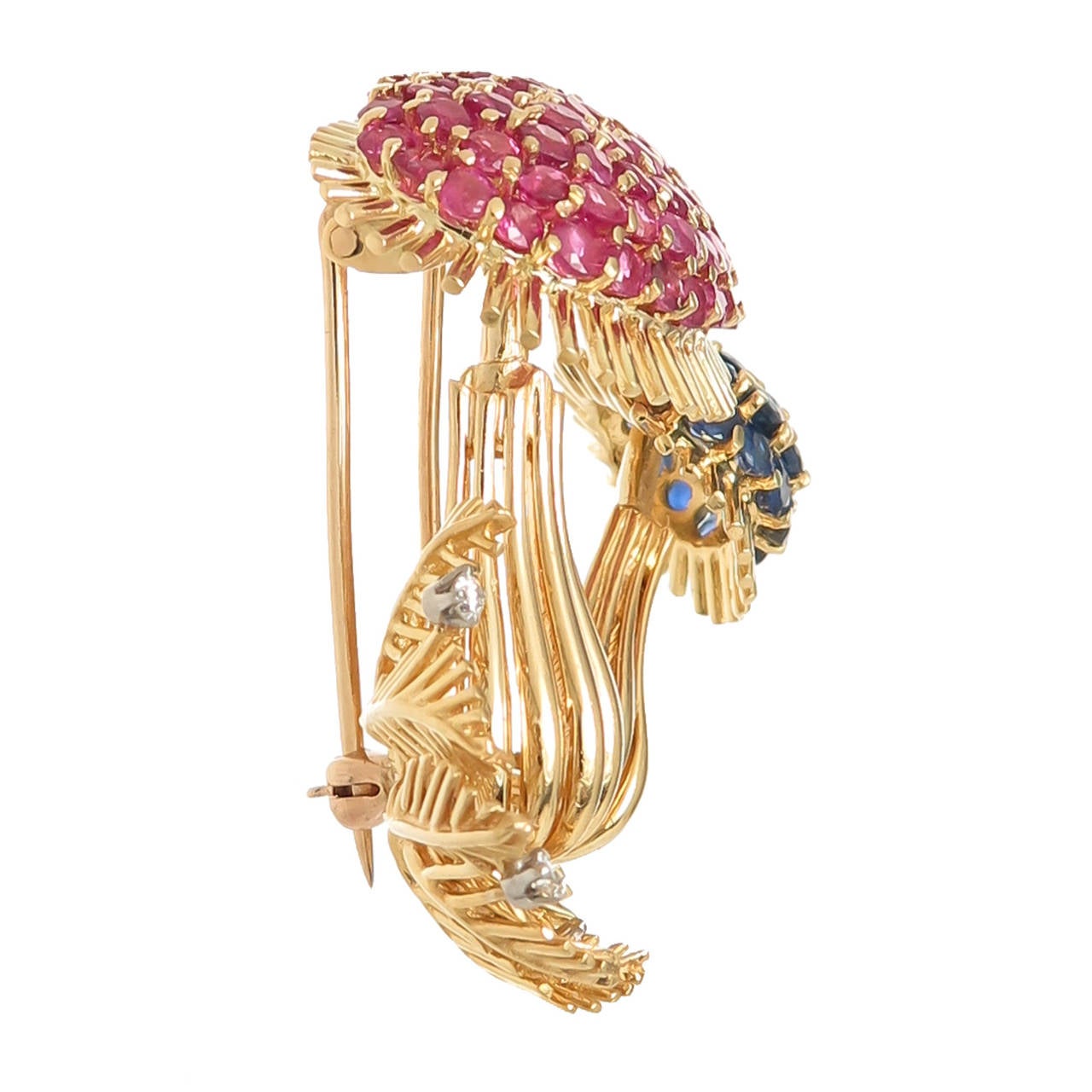 Circa 1970 18K yellow Gold Mushroom Clip Brooch by Tiffany & Company, very nicely detailed and set with Rubies, Sapphires and Diamonds. Measuring 1 5/8 X  1 3/8 Inch.