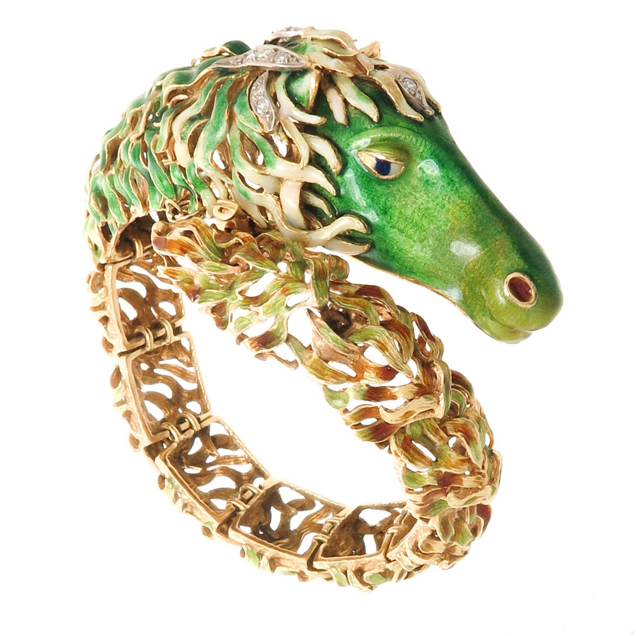 Circa 1970s 18k Yellow Gold and Enamel, Sea Horse Bracelet, very intricate and well made having articulated links. Detailed in Green, White and Red Enamel and further set with accenting Diamonds. A large substantial piece measuring 7 1/2 inch in