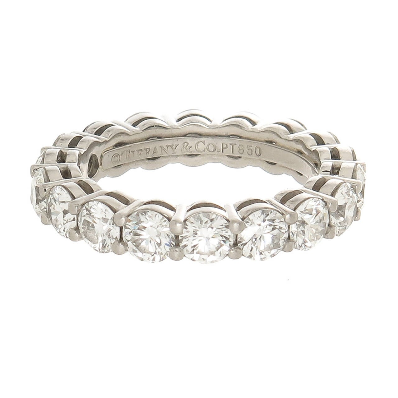 Tiffany and Company Platinum and Diamond Eternity ring, set with 18 Round Brilliant cut Diamonds that total 2.86 carats. Comes with original Boxes and Tiffany Paperwork. Finger size = 5 1/4