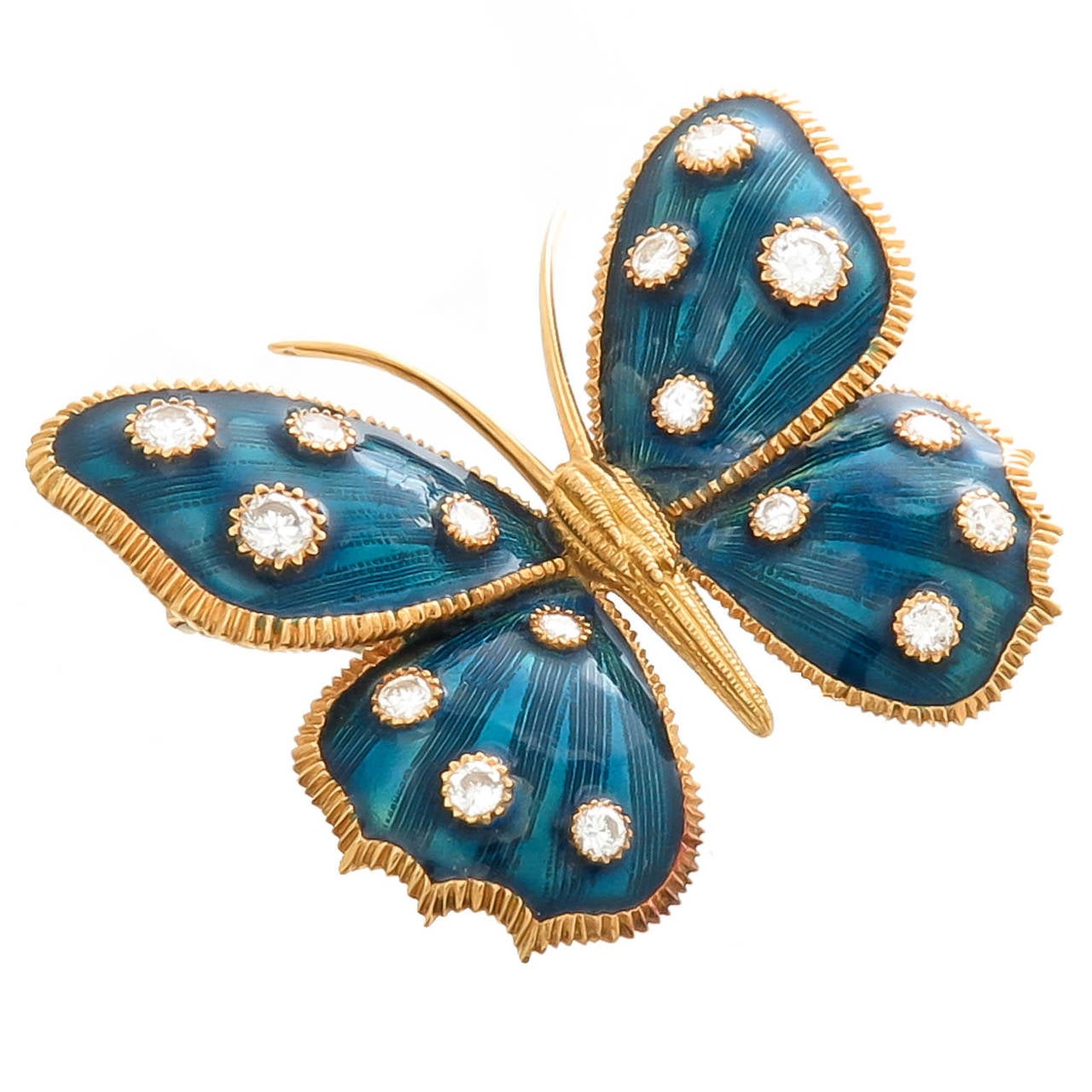 Circa 1980 Butterfly Brooch by Van Cleef and Arpels, 18K Yellow Gold, Blue Guilloche Enamel and set with Round Brilliant cut Diamonds totaling 1.15 Carat. Having a Double pin-clip back, signed, numbered and having French Hall Marks.