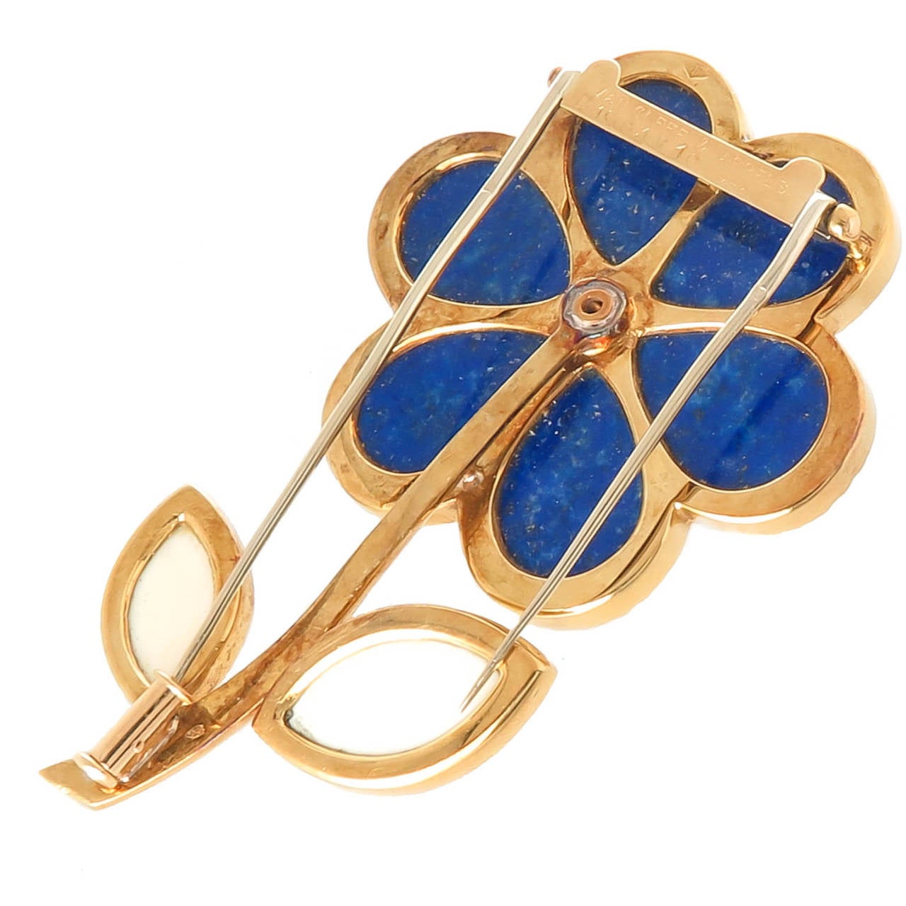 Circa 1970s Van Cleef and Arpels Large Flower Brooch, 18K Yellow Gold, set with Diamonds, Lapis Lazuli and White Bone. Having a Double pin- clip back. Signed, Numbered and Having French Hall Marks.