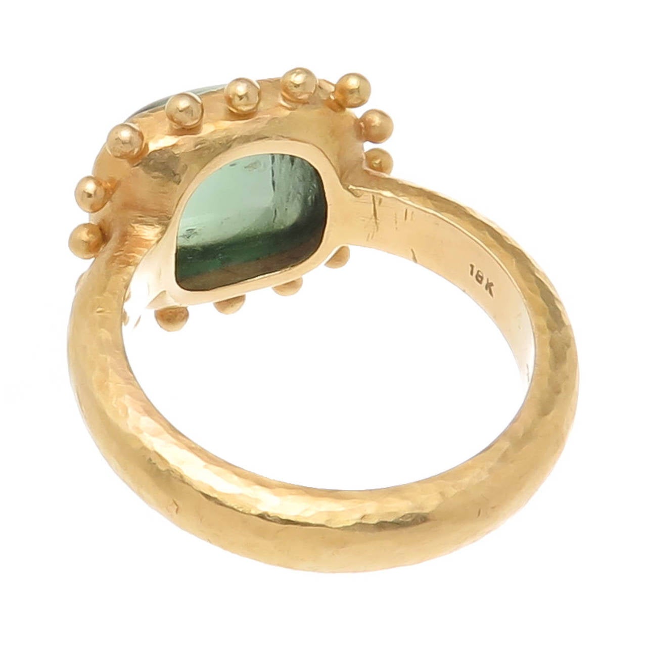 Circa 2010 Elizabeth Locke 18K yellow Gold and Tourmaline Cabochon ring, heavy, hand made and hand Hammered in a Locke's signature style. gem Color Tourmeline measuring 12.5 X 10.5  X  6.8 totaling 7 carats. Finger Size = 10.5