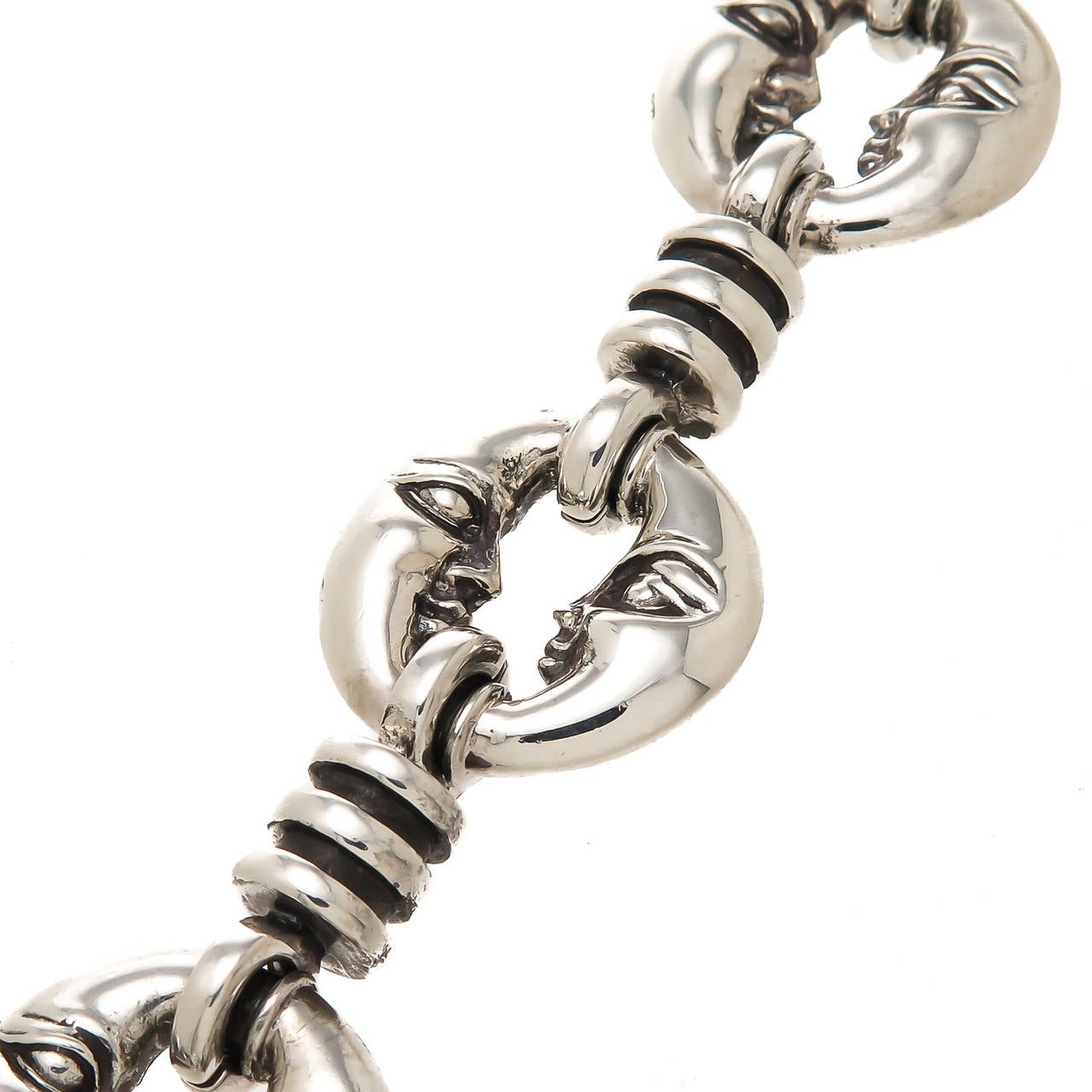 Circa 1990s sterling silver Man in the Moon bracelet by Barry Kieselstein-Cord, having good weight and being very detailed in one of Kieselstein-Cord's iconic themes, having a toggle clasp.